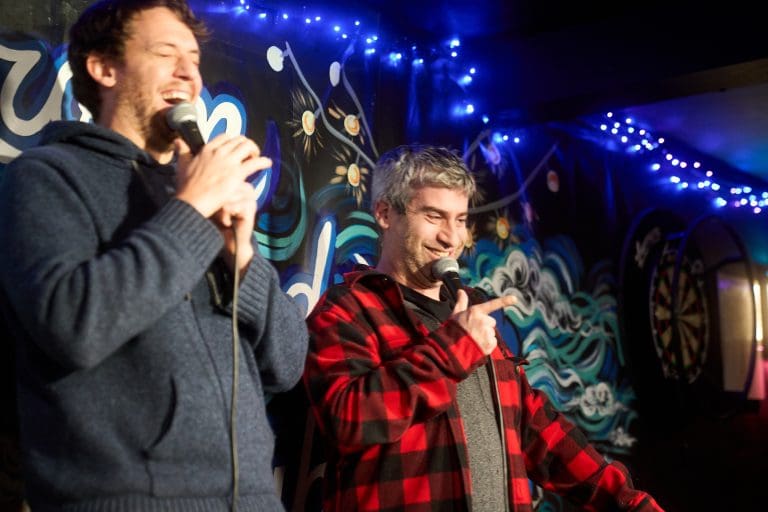 Backroom owners Ariel Kagan and Brandon Sobel, who teach the Comedy Dojo, on stage at the club